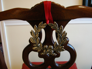 Silver Wreath Christmas Ornament on Chair Back by Classic Legacy Silver Wreath Christmas Ornament on Chair Back by Classic Legacy